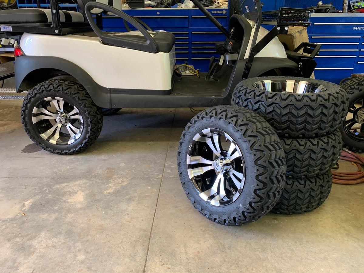 14" Vampire Black & Machine Aluminum Wheels with 23x10-14 All-Terrain Tires | Set of 4